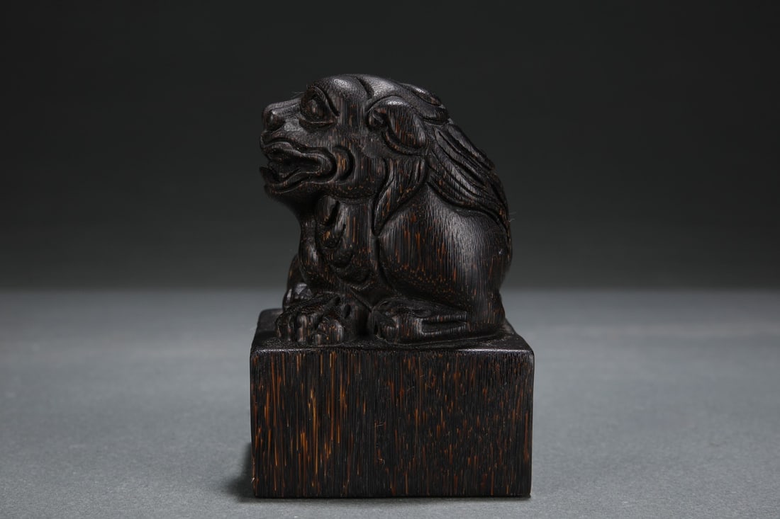 An Exquisite Eaglewood Lion Pattern Seal: An Exquisite Eaglewood Lion Pattern Seal,Qing Dynasty,ChinaSize:3.1inx3.1inx4.5in沉香木狮子纹印章,中国清代,Size:8cmx8cmx11.5cm