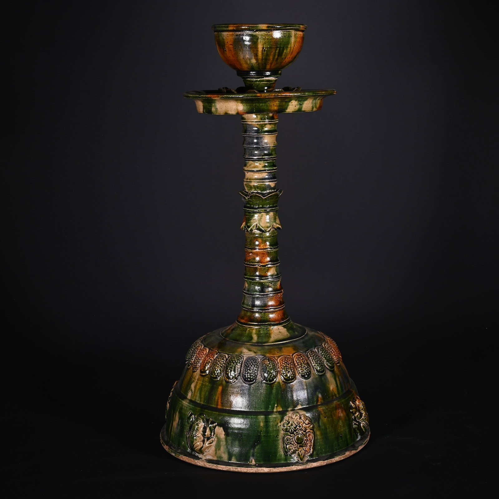 A Huge Tang Tri-Color Glazed Pottery Candlestick: A Huge Tang Tri-Color Glazed Pottery Candlestick,Tang Dynasty, China,Size:18.9inx9.4in,Weight:3050g唐三彩烛台,中国唐代,Size:48cmx24cm,Weight:3050g