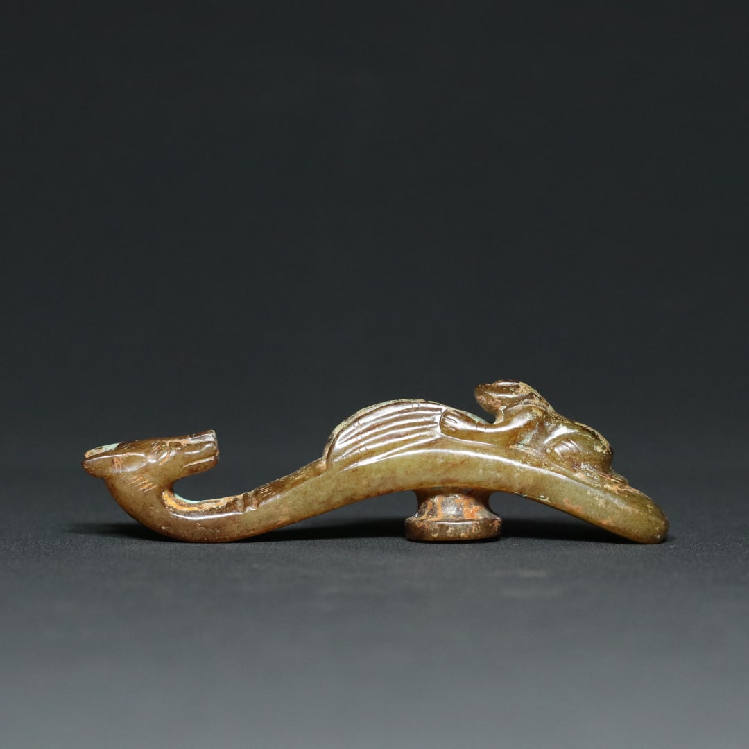 An Exquisite White Jade Figure Pattern Dragon-head Hook: An Exquisite White Jade Figure Pattern Dragon-head Hook,Han