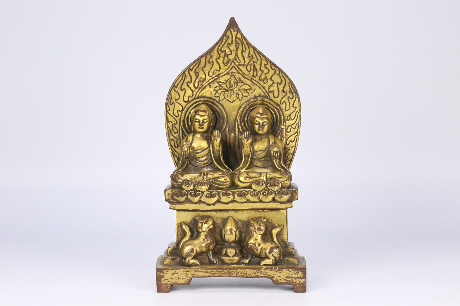 A Solemn Gilt Bronze Buddha Statue: A Solemn Gilt Bronze Buddha Statue,Tang Dynasty, ChinaSize:9.1inx4.9inx2.4in,Weight:1258.5g铜鎏金佛像,中国唐代,Size:23cmx12.5cmx6cm,Weight:1258.5g