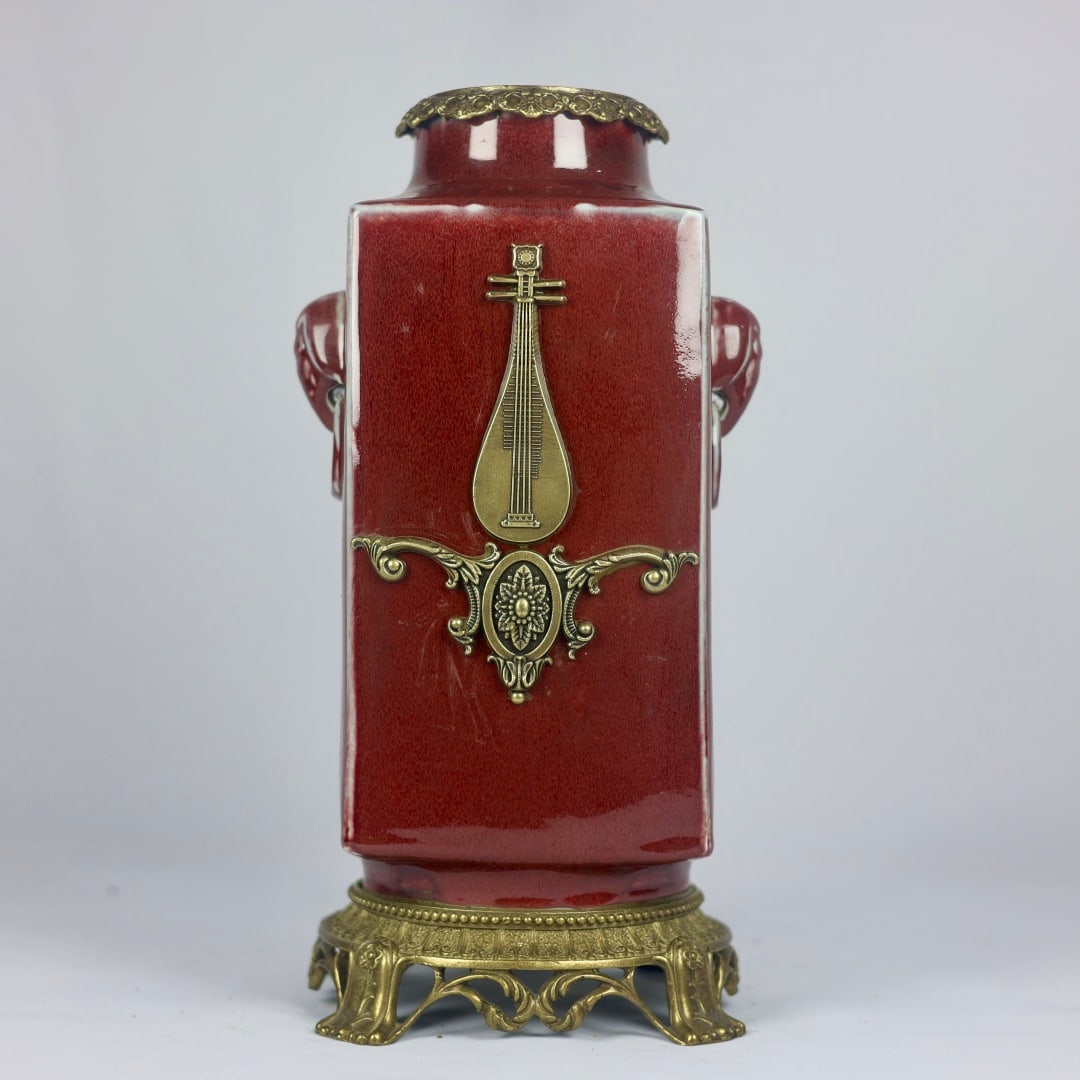 A Rare Red Glazed Inlaid Bronze Pipa Pattern Pattern Elephant-Ears Vase: A Rare Red Glazed Inlaid Bronze Pipa Pattern Pattern Elephant-Ears Vase,Qing Dynasty,China,Yongzheng Six-character Mark,Size:13.8inx7.1inx6.1in红釉镶铜琵琶纹&