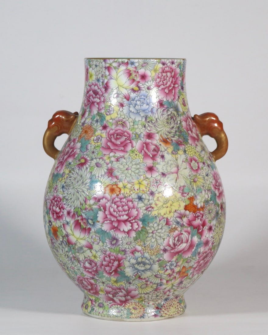 A Rare Famille-Rose Painted Gold Flower Pattern Vase: A Rare Famille-Rose Painted Gold Flower Pattern Vase,Qing Dynasty,China,Qianlong Six-character Mark,Size:12.6inx8.3in粉彩描金花卉纹瓶,中国&#
