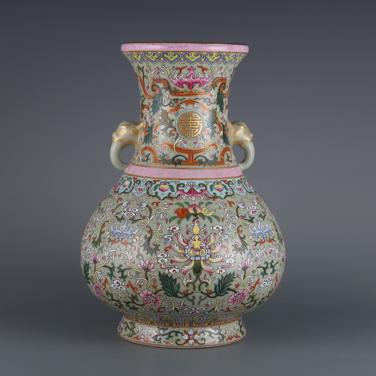 A Rare Famille-Rose Celadon Glazed Bats and Peach Pattern Lotus Pattern Double-Ears Vase: A Rare Famille-Rose Celadon Glazed Bats and Peach Pattern Lotus Pattern Double-Ears Vase Qing Dynasty, China Qianlong Six-character MarkSize:12.6inx5.4in粉彩青釉福寿