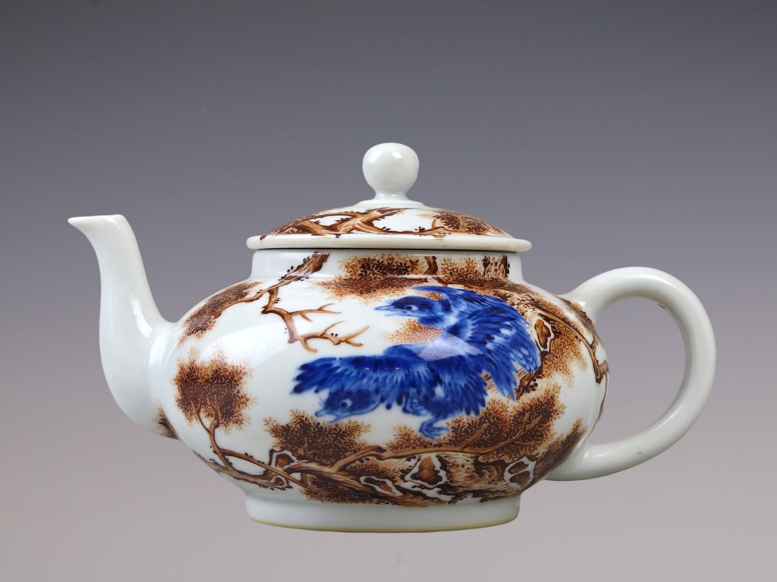 An Exquisite Ink Color Flower and Bird Pattern with poem Teapot: An Exquisite Ink Color Flower and Bird Pattern with poem Teapot Qing Dynasty, China Qianlong Six-character Mark Size:3.9inx6.7in墨彩花鸟纹诗文茶壶