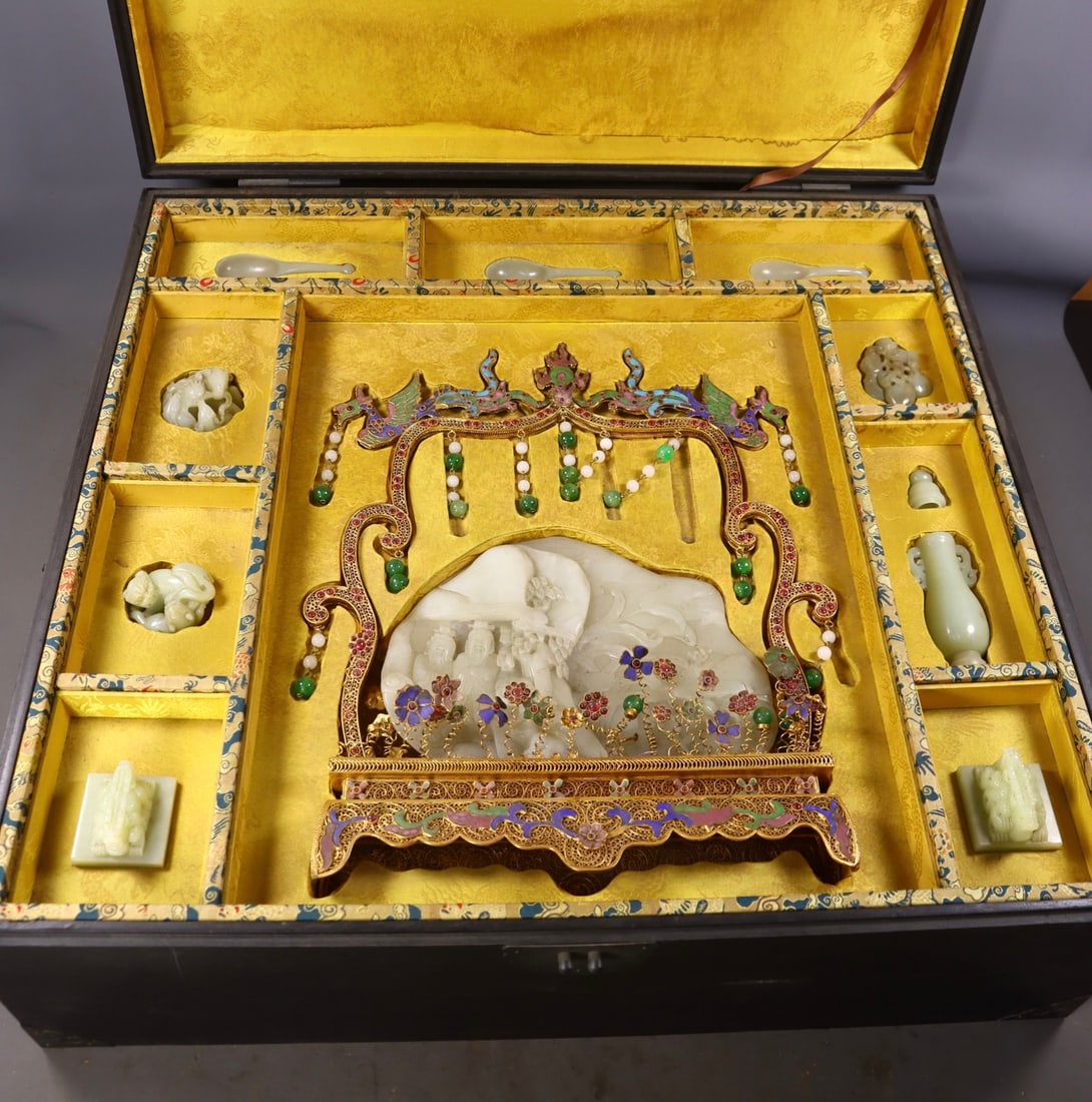 A Set of Huge Filigree and Gilding Inlaid White Jade Ornaments,Inlaid Gems: A Set of Huge Filigree and Gilding Inlaid White Jade Ornaments,Inlaid Gems,Qing Dynasty,China,Qianlong Four-character Mark,Size:(Ornament)16.1inx13.2inx2.8in,(Vase)5.3inx1.8inx1.4in,(Seal)2inx2in,Tota