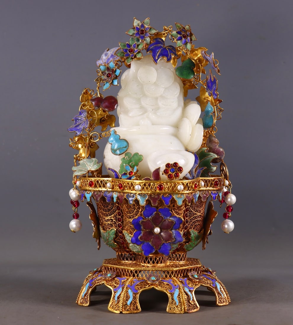 An Exquisite Filigree Gilt Inlaid Gems Flower Basket Hold Hotan White Jade Ornament: An Exquisite Filigree Gilt Inlaid Gems Flower Basket Hold Hotan White Jade Ornament,Qing Dynasty, China,Qianlong Four-character Mark,Size:10in(Height),5.7in(BaseDiameter),Weight:1671g