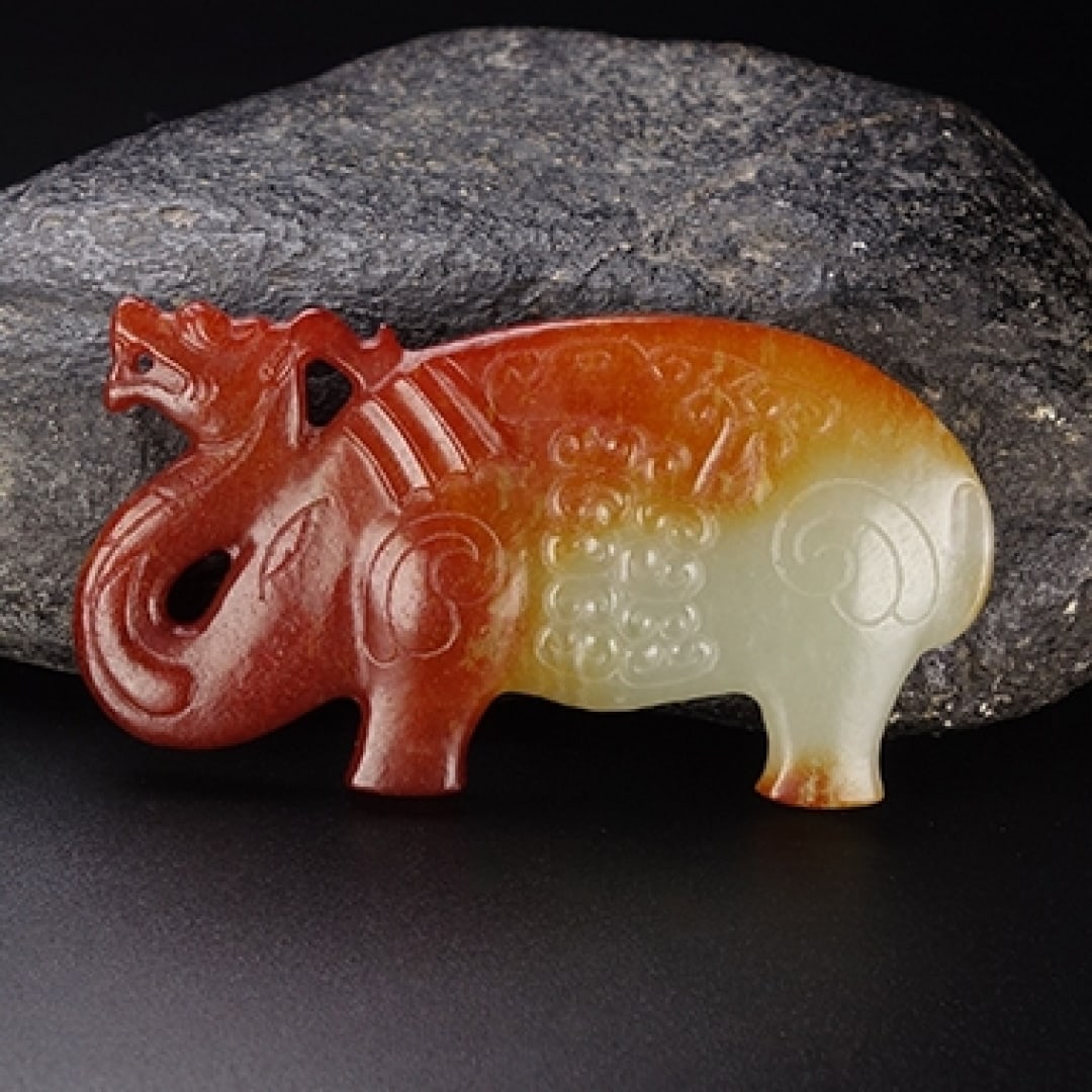 An Exquisite Hotan Jade Elephant: An Exquisite Hotan Jade Elephant,Han Dynasty, China,Size:2.6inx1.4inx0.2in,Weight:26.8g 和田玉象,中国汉代