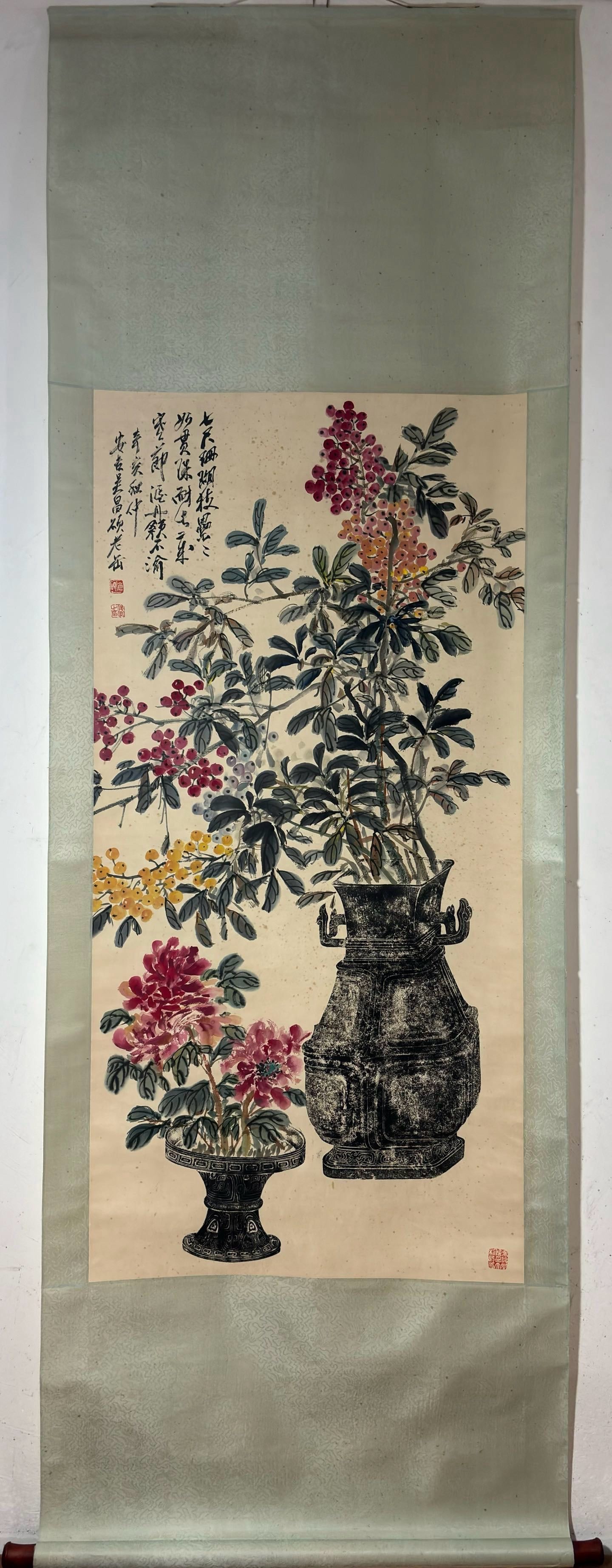 A Chinese Vertical Scroll Ink Painting of Flowers on Paper: A Chinese Vertical Scroll Ink Painting of Flowers on Paper,Modern Time of China,Wu Changshuo,without frame size:53.9inx26.4in 一幅中国水墨纸本花&#
