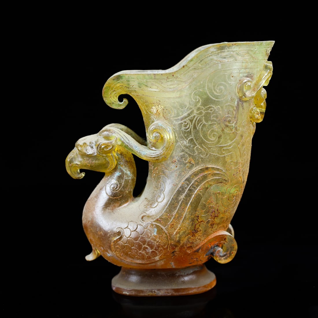 An Exquisite Glass Phoenix Cup: An Exquisite Glass Phoenix Cup,Han Dynasty, China,Size:5.1inx3.9inx2in,Weight:425g 琉璃凤杯,中国汉代