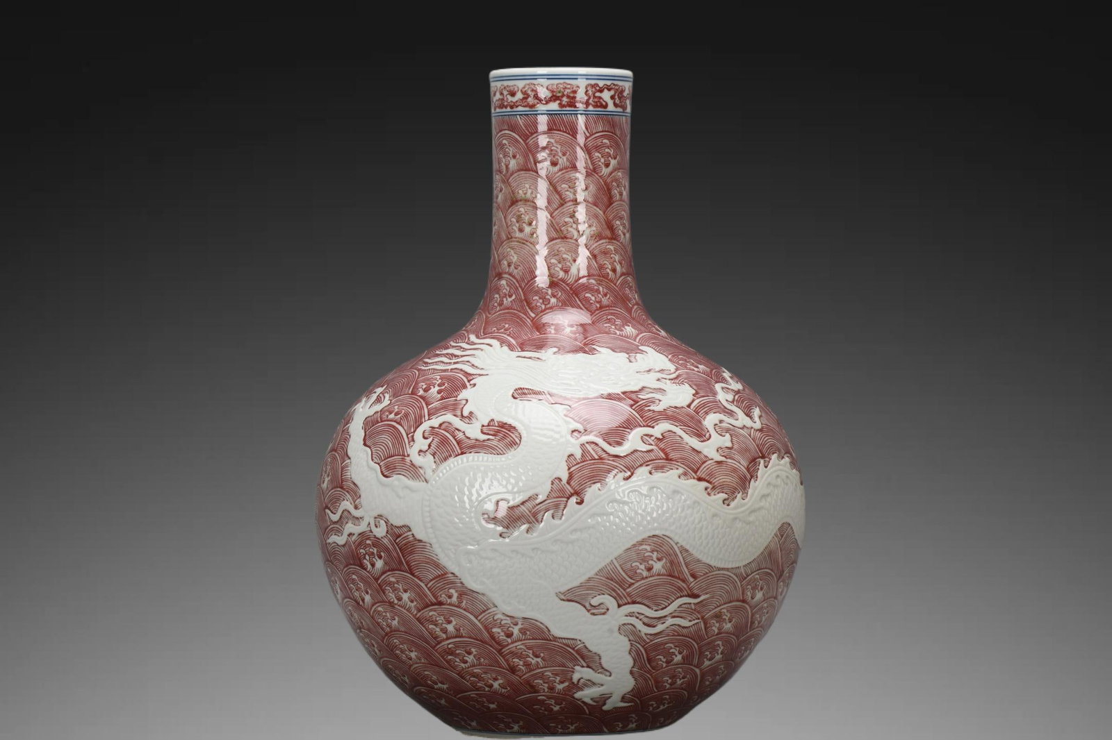 An Exquisite Underglaze-Red Dragon Pattern Vase: An Exquisite Underglaze-Red Dragon Pattern Vase,Qing Dynasty, China,Yongzheng Six-character Mark,Size:17.3inx3.9inx13inx5.9in 釉里红龙纹瓶,中国清&