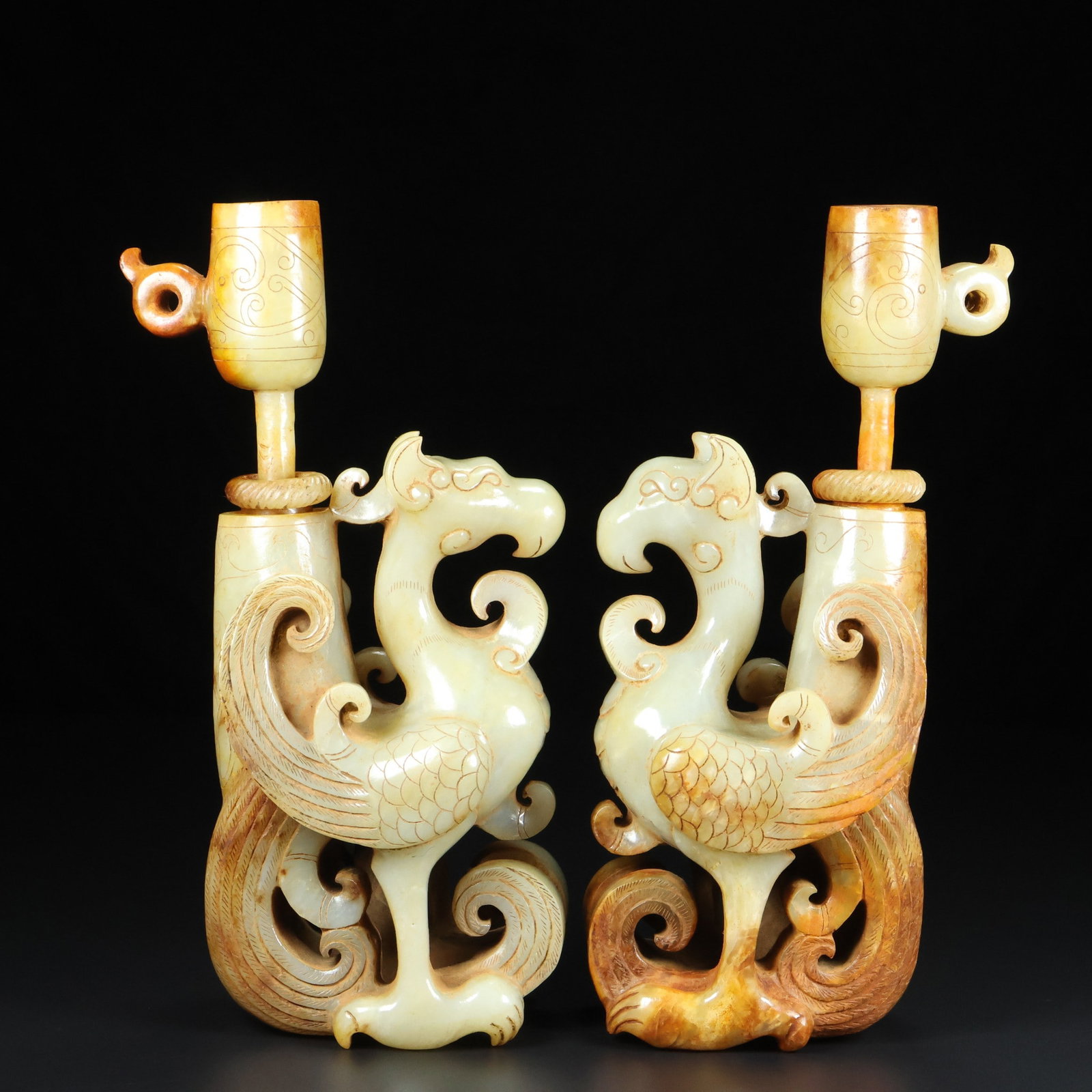 A pair of Exquisite Hotan Jade Phoenix Goblet: A pair of Exquisite Hotan Jade Phoenix Goblet,Qing Dynasty, China,Size:6.1inx3.3inx3.5in(Phoenix),3.1inx2in(Cup),Weight:2147g 一对和田玉凤爵杯,中&