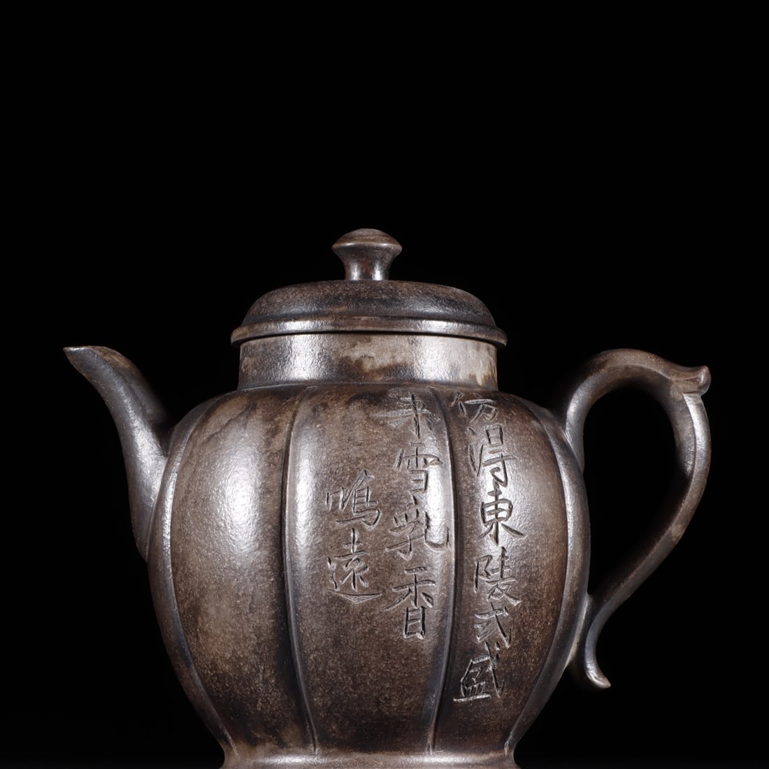 An Exquisite Zisha Melon Rib Teapot: An Exquisite Zisha Melon Rib Teapot,Qing Dynasty, China,With Mark,Size:4.5inx5.3in 紫砂瓜菱壶,中国清代,带款