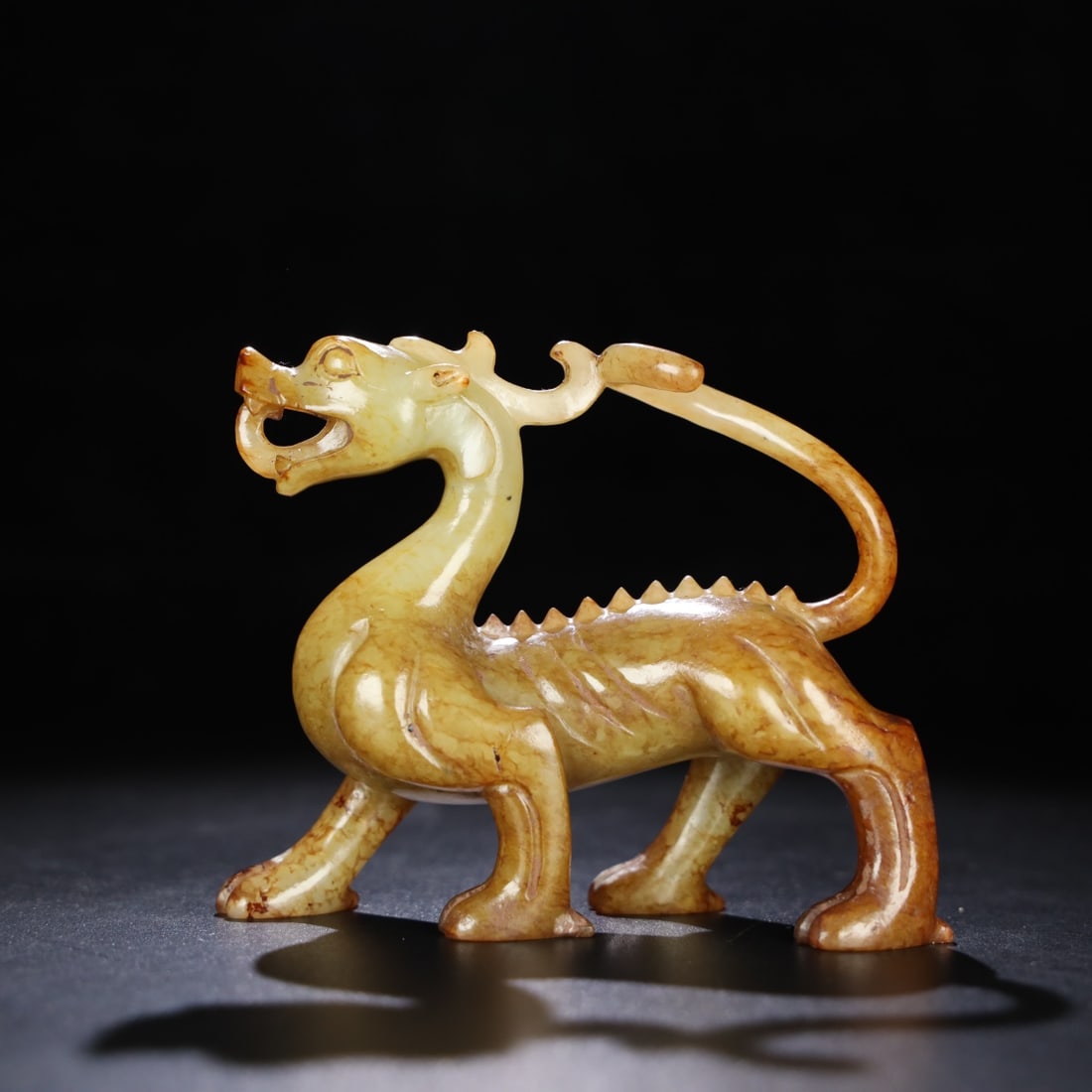 An Exquisite Hotan Jade Auspicious Beast Ornament: An Exquisite Hotan Jade Auspicious Beast Ornament,Han Dynasty, China,Size:4.5inx1.9inx3.6in,Weight:255.8g 和田玉瑞兽摆件,中国汉代