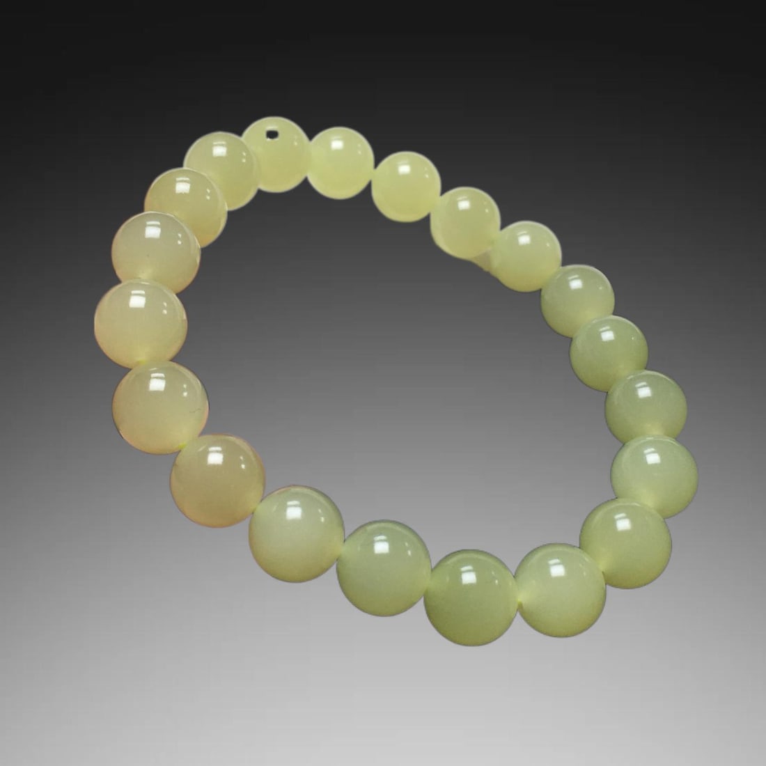 An Exquisite Hotan Yellow Jade Round Bead Bracelets: An Exquisite Hotan Yellow Jade Round Bead Bracelets,Qing Dynasty, China,Size:0.4in 和田黄玉圆珠手串,中国清代