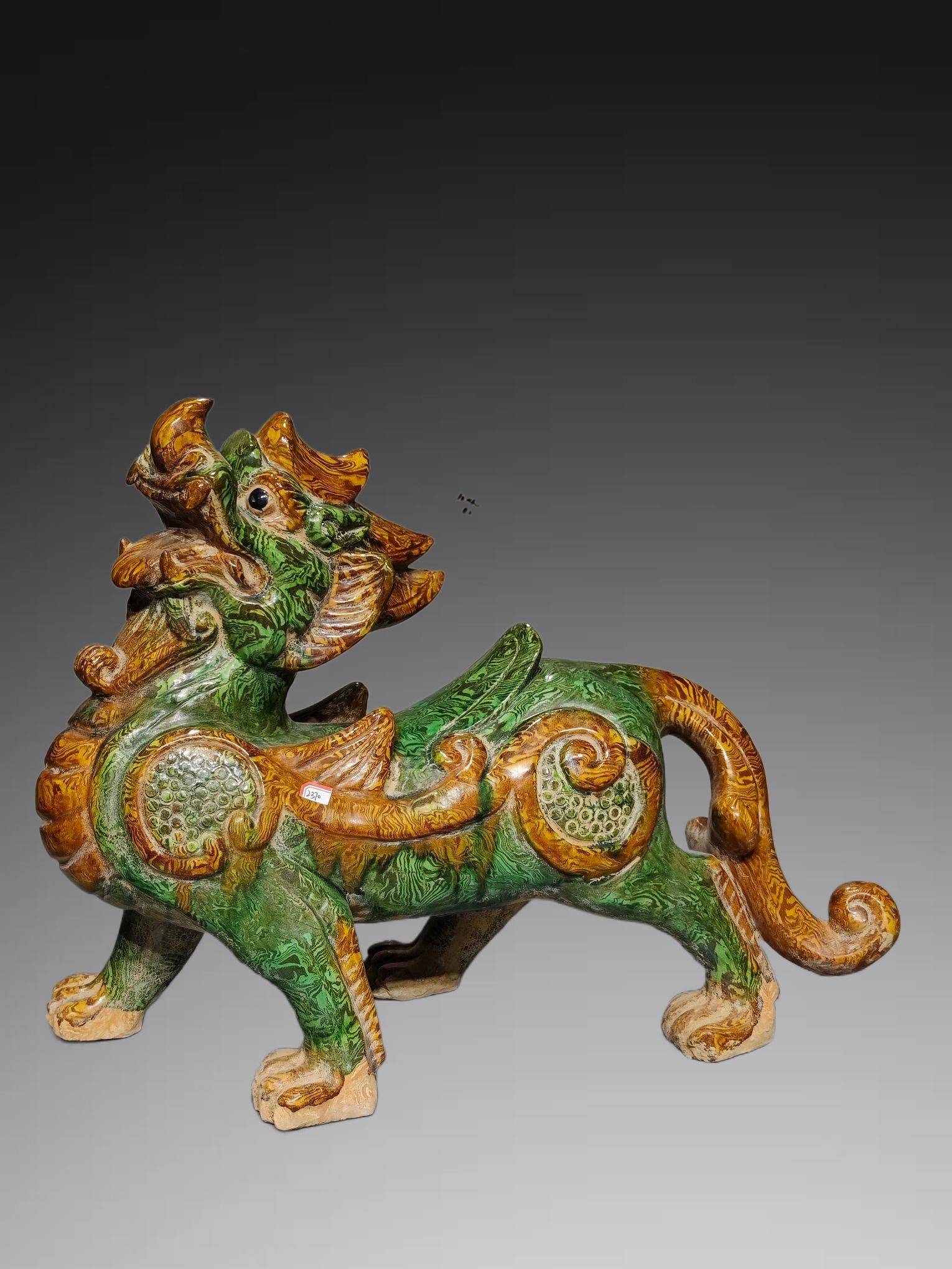 An Exquisite Tang Tri-Color Glazed Pottery Auspicious Beast Ornament (1 of 5)