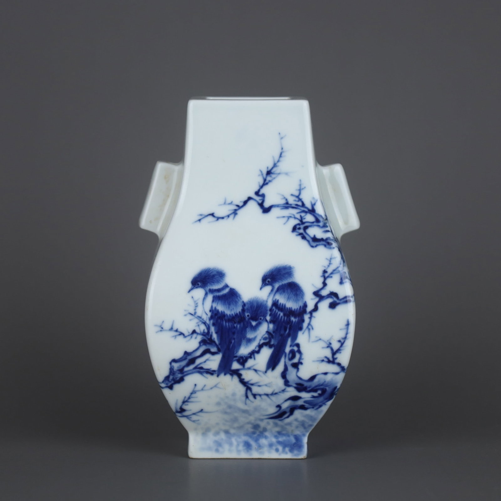 An Exquisite Blue and White Flower and Bird Pattern Tube Ears Vase: An Exquisite Blue and White Flower and Bird Pattern Tube Ears Vase,Republic of China,With Mark,Size:5.2inx3.3in 青花花鸟纹贯耳瓶,民国,४