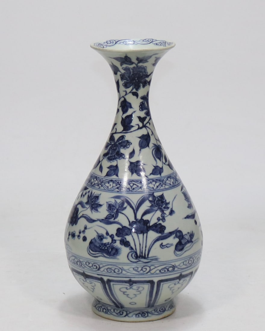 An Exquisite Blue and White Flower and Bird Pattern Vase: An Exquisite Blue and White Flower and Bird Pattern Vase,Yuan Dynasty, China,Size:11.6inx3.5in 青花花鸟纹瓶,中国元代