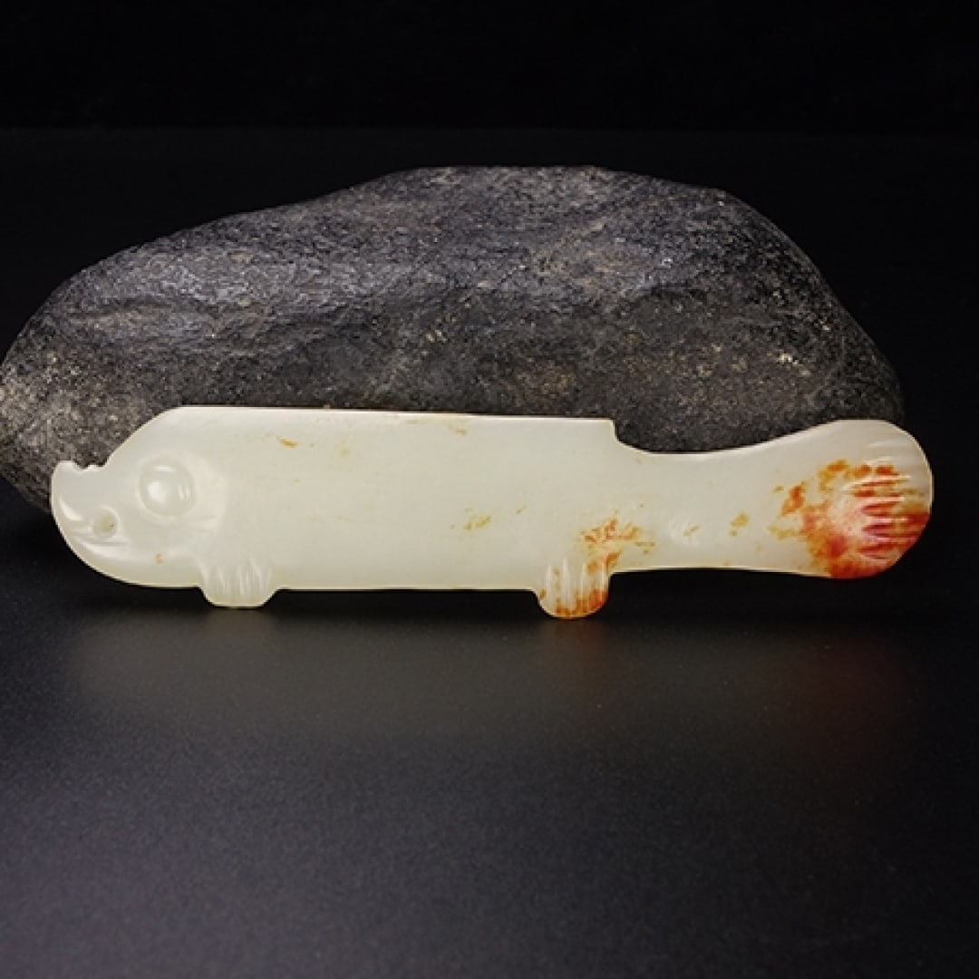 An Exquisite Hotan Jade Fish: An Exquisite Hotan Jade Fish,Han Dynasty, China,Size:3.9inx0.9inx0.2in,Weight:23g 和田玉鱼,中国汉代