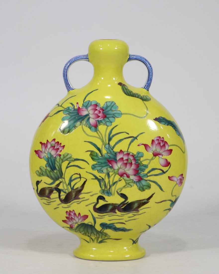 An Exquisite Yellow Ground Famille-Rose Flower and Bird Pattern Vase: An Exquisite Yellow Ground Famille-Rose Flower and Bird Pattern Vase,Qing Dynasty, China,Qianlong Six-character Mark,Size:9.5inx6.5in 黄地粉彩花鸟纹瓶,&