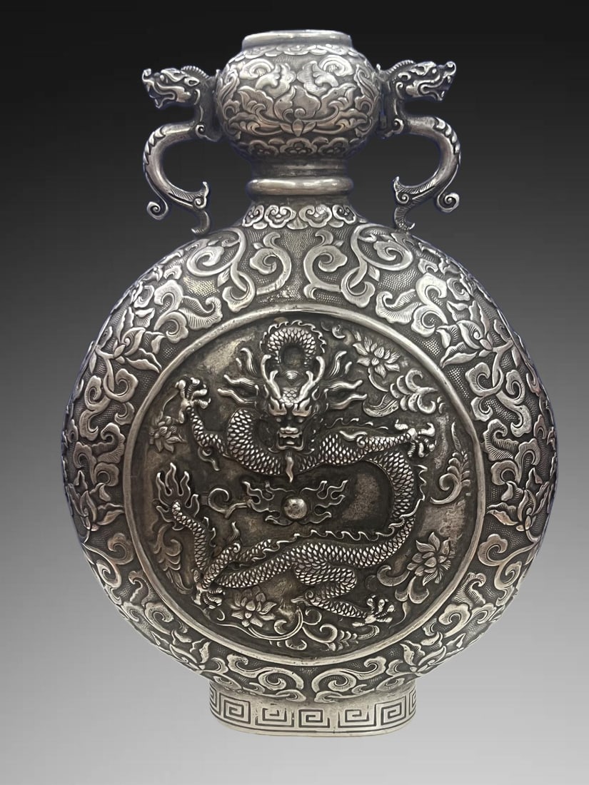 An Exquisite Silver Gilded Copper Dragon Pattern Ewer: An Exquisite Silver Gilded Copper Dragon Pattern Ewer,Qing Dynasty, China,Qianlong Four-character Mark,Size:8.9in,Weight:1653.6g 铜鎏银龙纹壶,中国଀