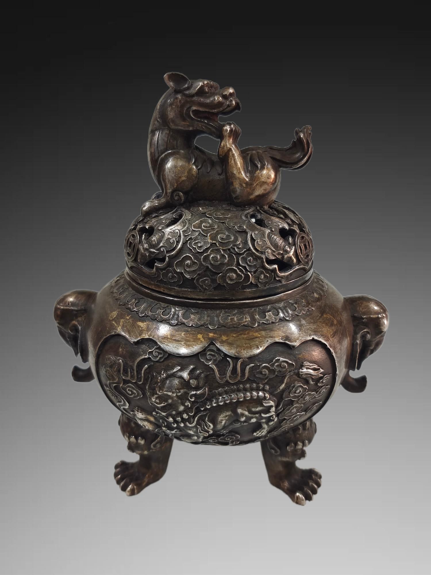 An Exquisite Silver Gilded Copper Kylin Elephant-Ears Censer: An Exquisite Silver Gilded Copper Kylin Elephant-Ears Censer,Qing Dynasty, China,Qianlong Four-character Mark,Size:7.7inx4.7in,Weight:1039g 铜鎏银麒麟象耳'