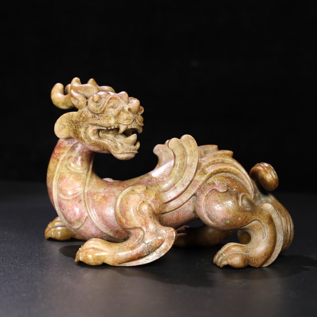 An Exquisite Hotan Jade Auspicious Beast Ornament: An Exquisite Hotan Jade Auspicious Beast Ornament,Han Dynasty, China,Size:7.1inx3.5inx4.8in,Weight:1288g 和田玉瑞兽摆件,中国汉代