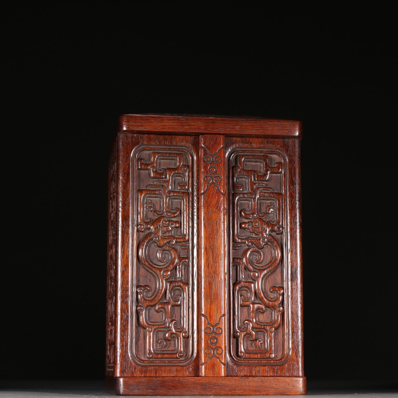 An Exquisite Huanghuali Wood Dragon Pattern Cabinet: An Exquisite Huanghuali Wood Dragon Pattern Cabinet,Qing Dynasty, China,Size:5.7inx7.7in,Weight:406.4g 黄花梨龙纹柜,中国清代