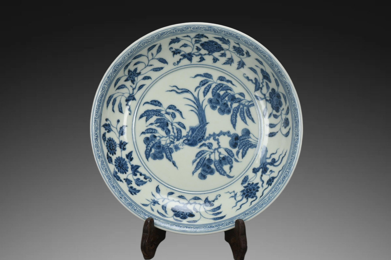 An Exquisite Blue and White Flower and Bird Pattern Plate: An Exquisite Blue and White Flower and Bird Pattern Plate,Ming Dynasty, China,Xuande Six-character Mark,Size:1.8inx8.9inx5.5in 青花花鸟纹盘,中国明