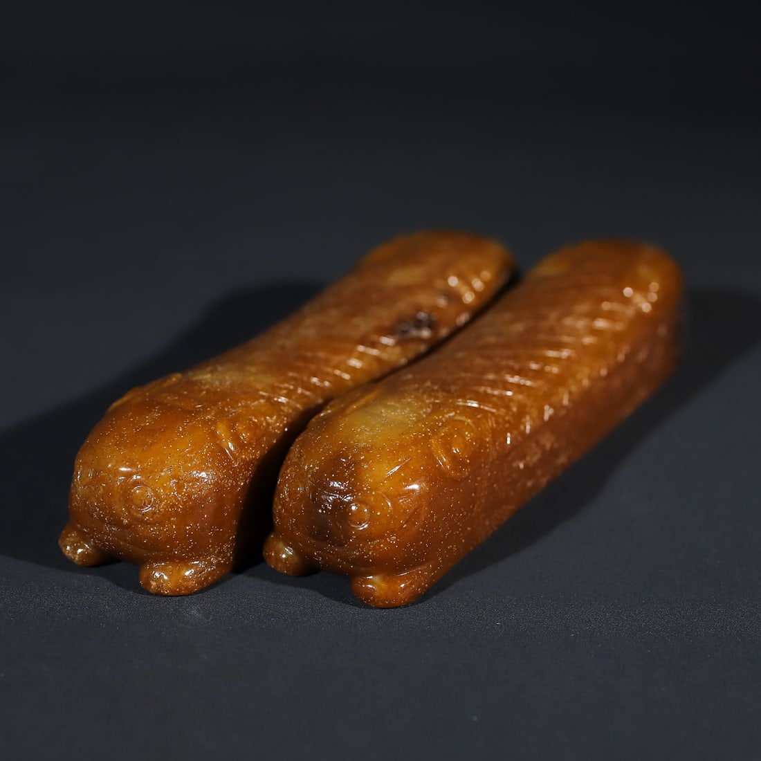A pair of Exquisite Hotan Jade Tiger Pulse Pillow: A pair of Exquisite Hotan Jade Tiger Pulse Pillow,Han Dynasty, China,Size:5.1inx1.2inx1in,5.1inx1.2inx0.9in,Weight:222.3g,220.4g 一对和田玉虎脉枕,ߑ