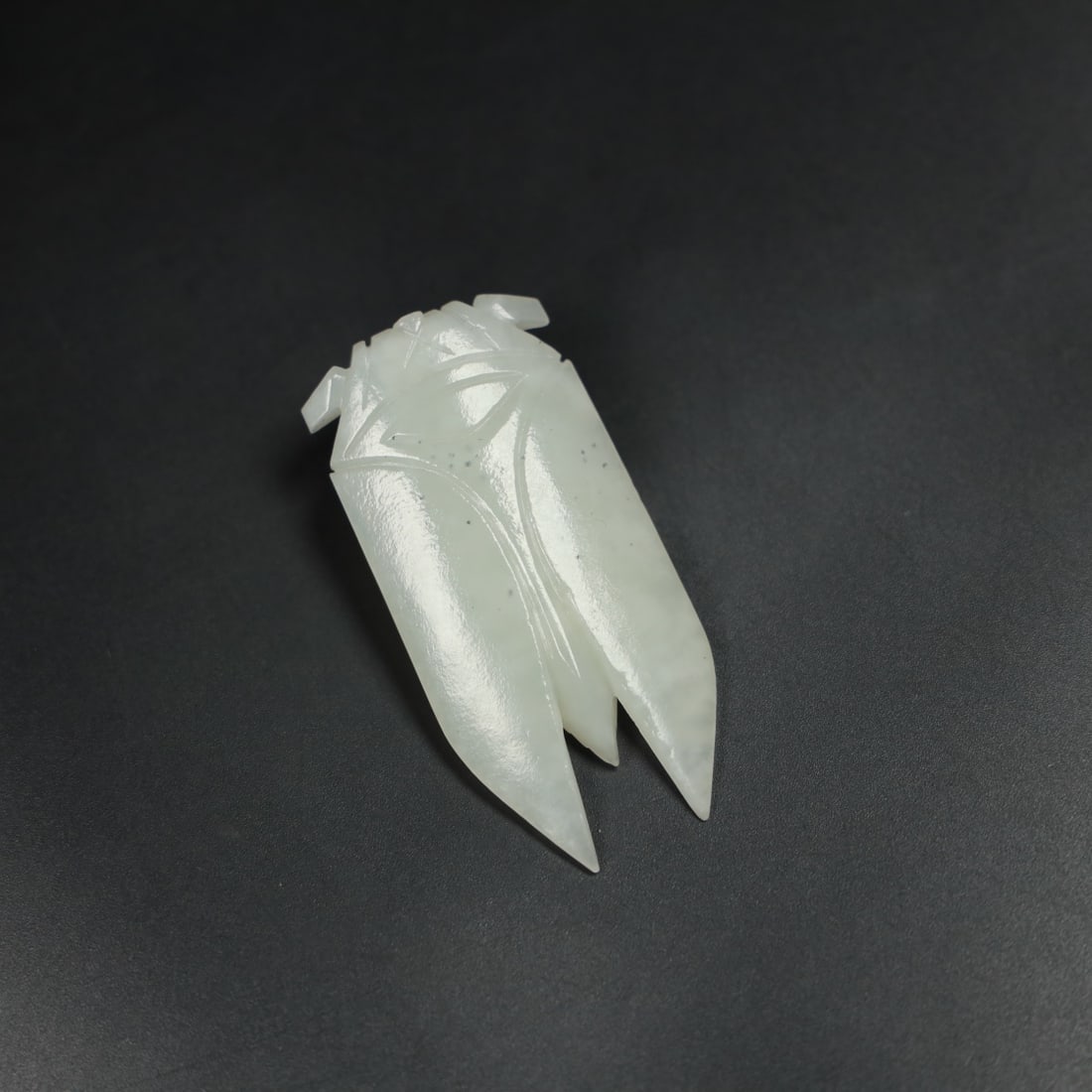 An Exquisite White Jade Cicada Ornament: An Exquisite White Jade Cicada Ornament,Qing Dynasty, China,Size:2.8inx1.3inx0.4in,Weight:33.8g 和田白玉蝉摆件,中国清代