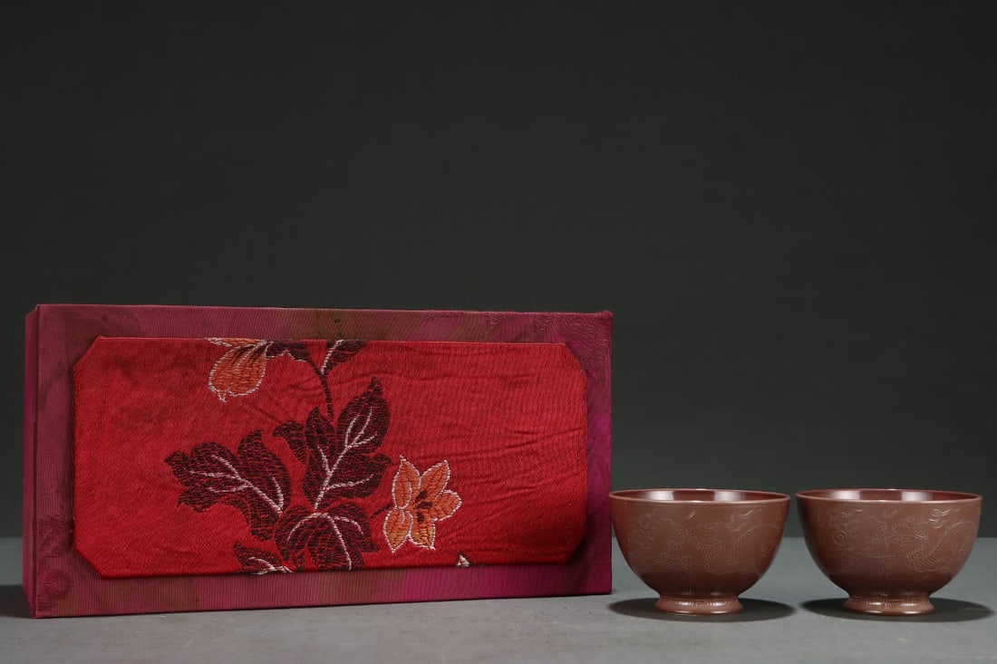 A Pair of Exquisite Aubergine Glazed Dragon Pattern Cup: A Pair of Exquisite Aubergine Glazed Dragon Pattern Cup,Qing Dynasty, China,Qianlong Six-character Mark,Size:2inx3.1in 一对茄皮紫釉龙纹杯,中