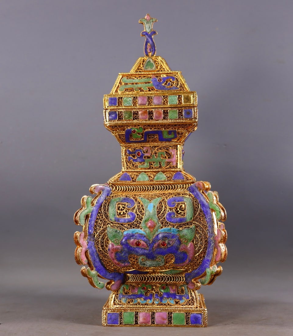An Exquisite Filigree Gilt Inlaid Gems Beast-Face Pattern Vase: An Exquisite Filigree Gilt Inlaid Gems Beast-Face Pattern Vase,Qing Dynasty, China,Qianlong Four-character Mark,Size:11inx5.1inx5.1in,Weight:1014g 花丝鎏金镶嵌ê