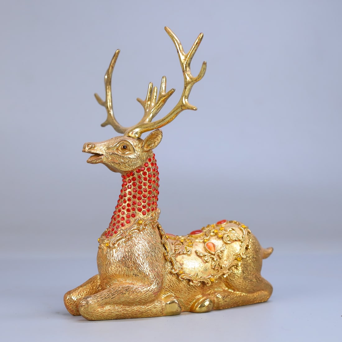 An Exquisite Gilt Copper Deer Ornament: An Exquisite Gilt Copper Deer Ornament,Qing Dynasty, China,Size:7.3inx6.3in ,Weight:675g 铜镀金鹿摆件,中国清代