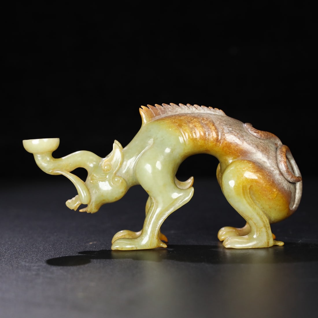 An Exquisite Hotan Jade Auspicious Beast Candlestick: An Exquisite Hotan Jade Auspicious Beast Candlestick,Han Dynasty, China,Size:6.7inx1.4inx3.5in,Weight:350g 和田玉瑞兽灯台,中国汉代