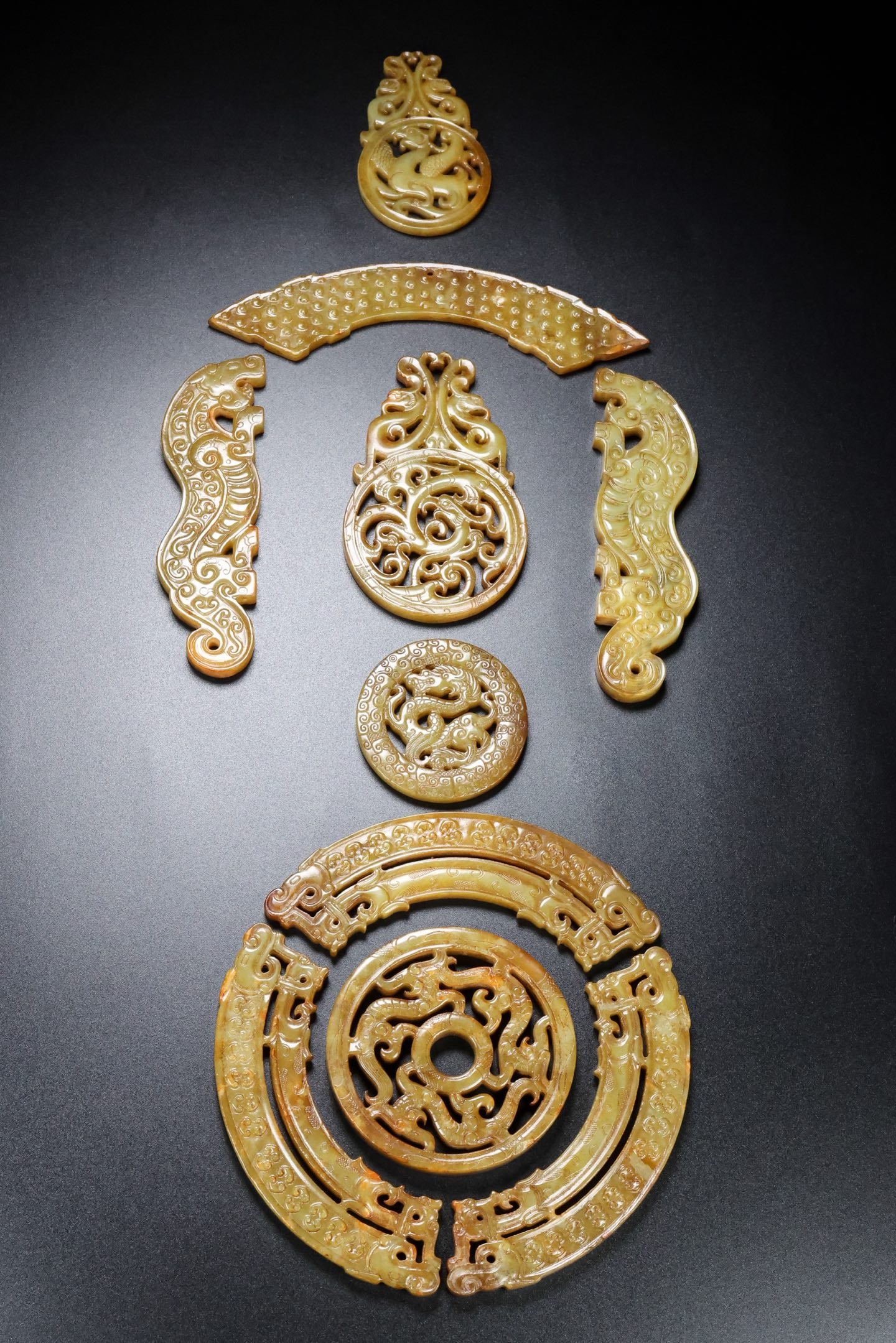 A Set of Exquisite Hotan Jade Bi: A Set of Exquisite Hotan Jade Bi,Han Dynasty, China,Size:19.7inx7.1inx0.2in,Weight:376g 一套和田玉璧,中国汉代