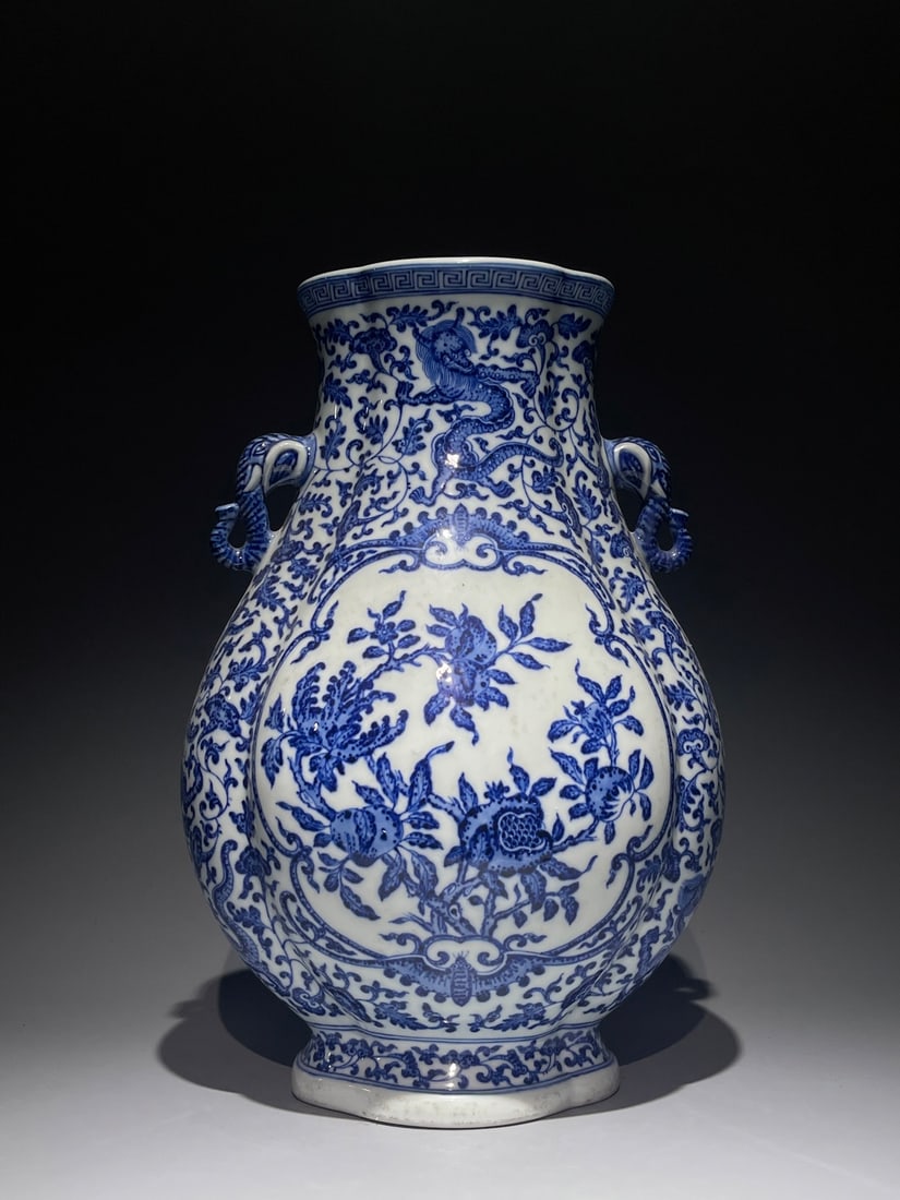 An Exquisite Blue and White Lotus Dragon Pattern Elephant-Ears Vase: An Exquisite Blue and White Lotus Dragon Pattern Elephant-Ears Vase,Qing Dynasty, China,Qianlong Six-character Mark,Size:15inx9.6in 青花缠枝莲龙纹象 