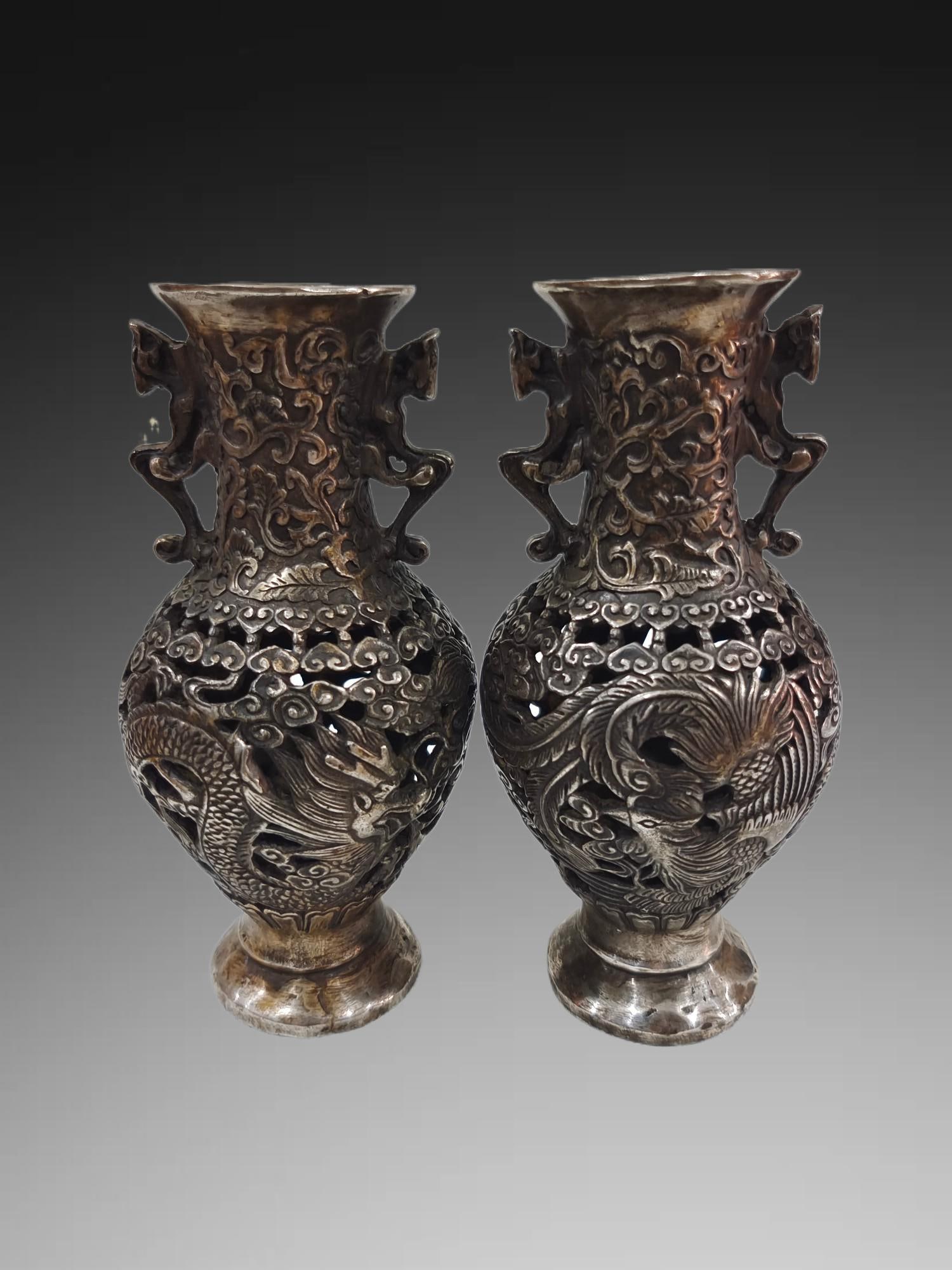 A pair of Exquisite Silver Gilded Copper Dragon and Phoenix Pattern Vase: A pair of Exquisite Silver Gilded Copper Dragon and Phoenix Pattern Vase,Qing Dynasty, China,With Mark,Size:3.1inx7.1in,Weight:1001g 一对铜鎏银龙凤纹