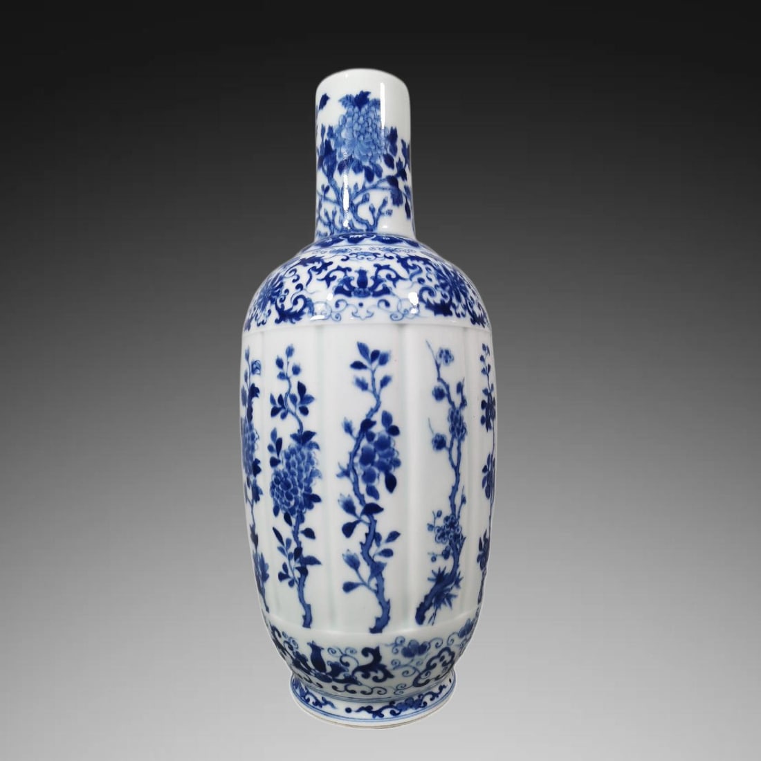 An Exquisite Blue and White Flower Pattern Vase: An Exquisite Blue and White Flower Pattern Vase,Qing Dynasty, China,Kangxi Six-character Mark,Size:14inx5.9in 青花花卉纹瓶,中国清代,康