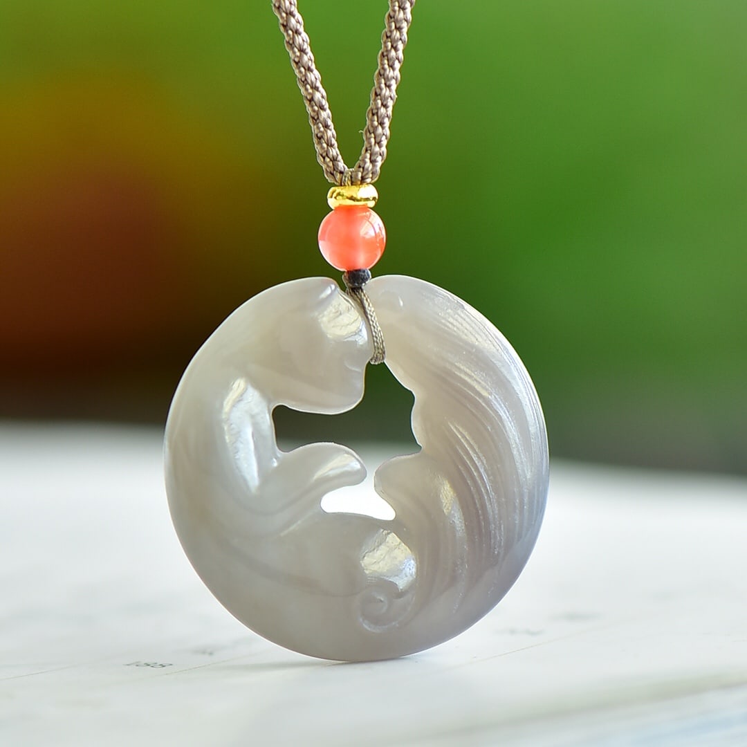 An Exquisite Hotan Jade Nine-Tailed Fox Pendant: An Exquisite Hotan Jade Nine-Tailed Fox Pendant,Size:1.2inx1.2in 和田玉烟紫九尾狐吊坠