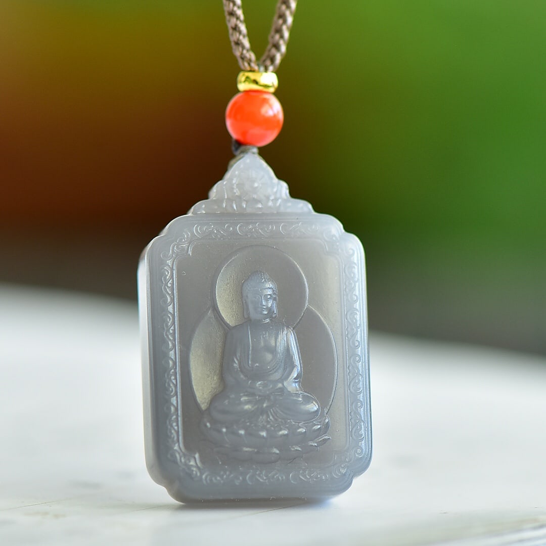 An Exquisite Hotan Jade Buddha Pendant: An Exquisite Hotan Jade Buddha Pendant,Size:1.3inx0.9in 和田玉烟紫佛吊坠