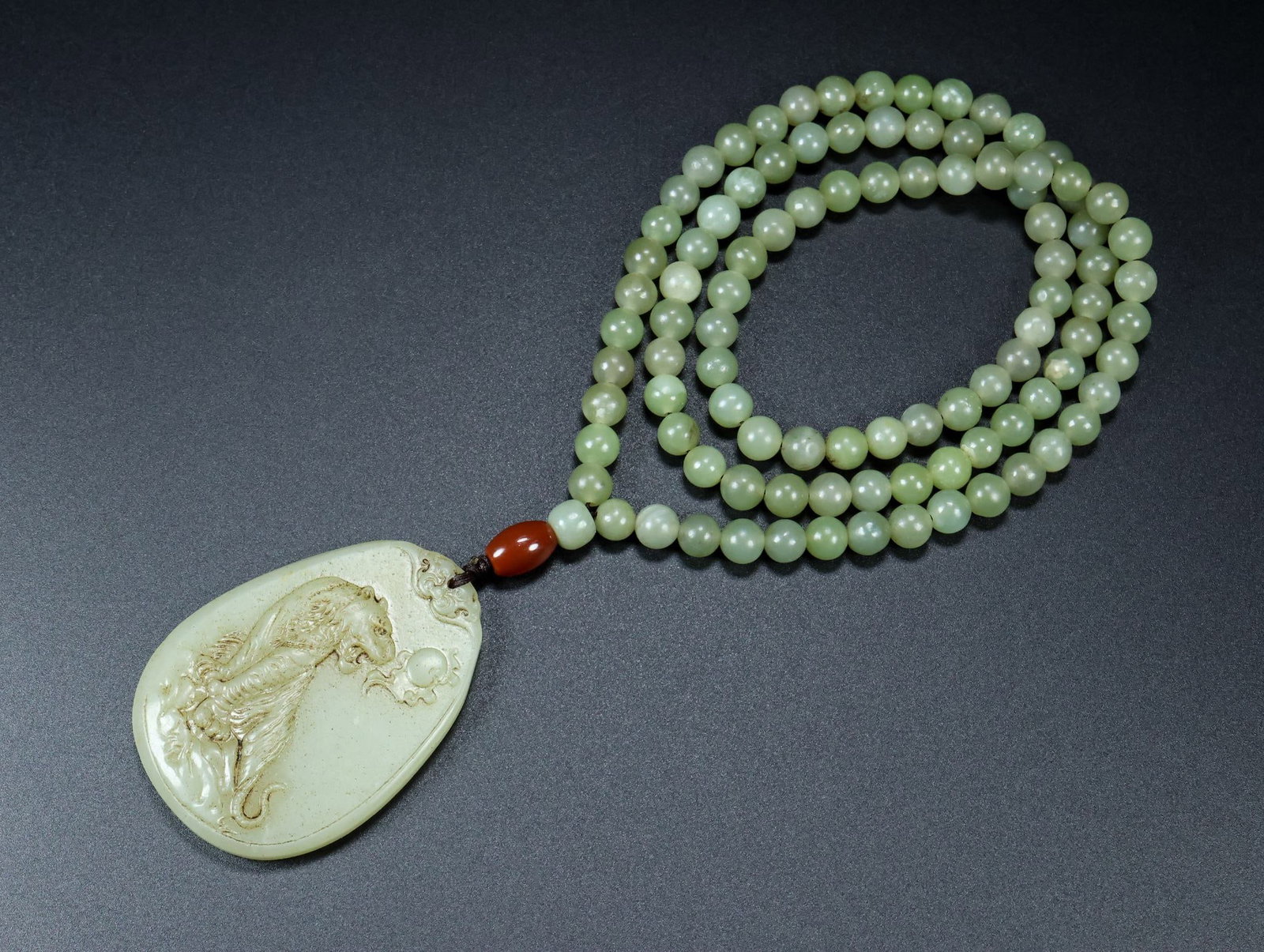 An Exquisite White Jade Tiger Pattern Pendant (1 of 9)