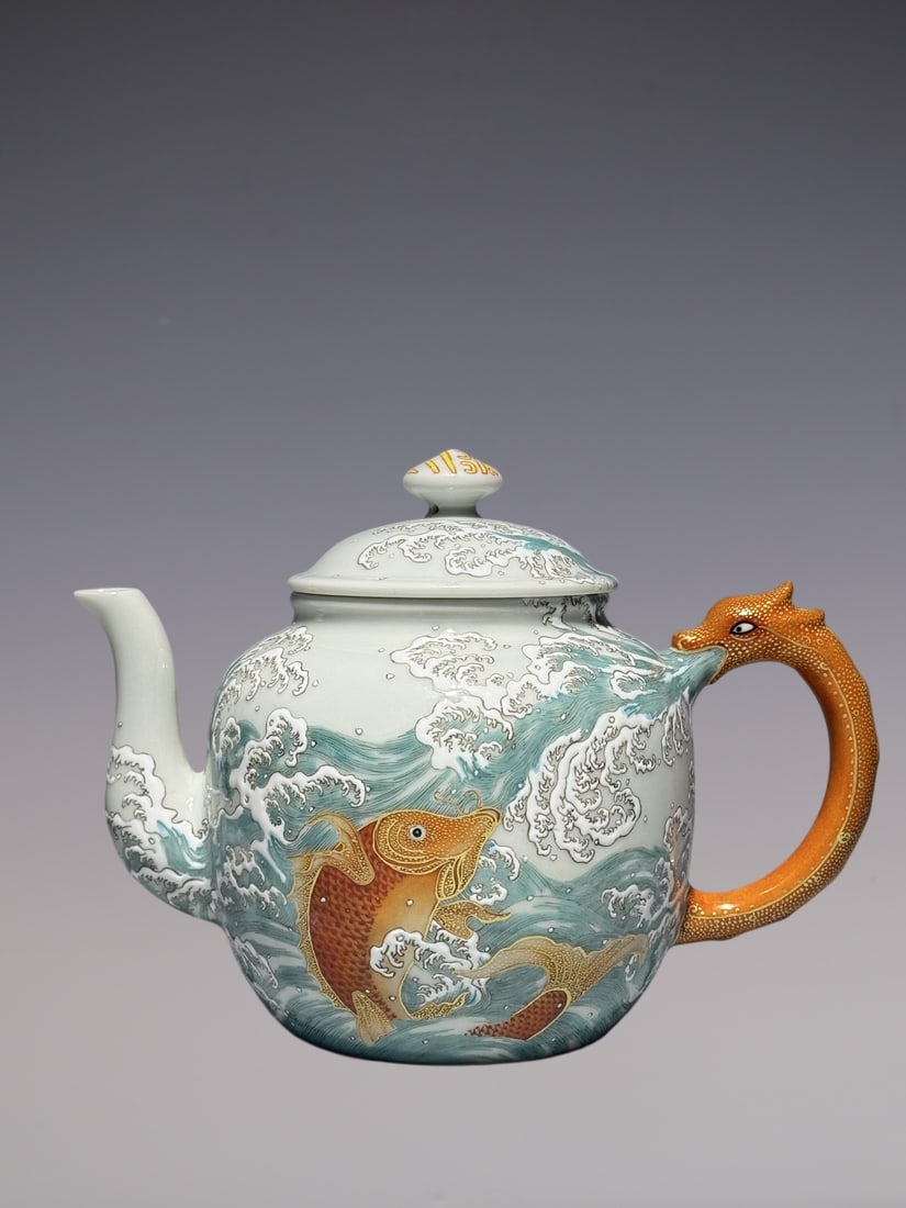 An Exquisite Famille-Rose Painted Gold Seawater and Fish Pattern Dragon-head Teapot: An Exquisite Famille-Rose Painted Gold Seawater and Fish Pattern Dragon-head Teapot,Qing Dynasty, China,Qianlong Six-character Mark,Size:5inx6.8in粉彩描金海水ྦ