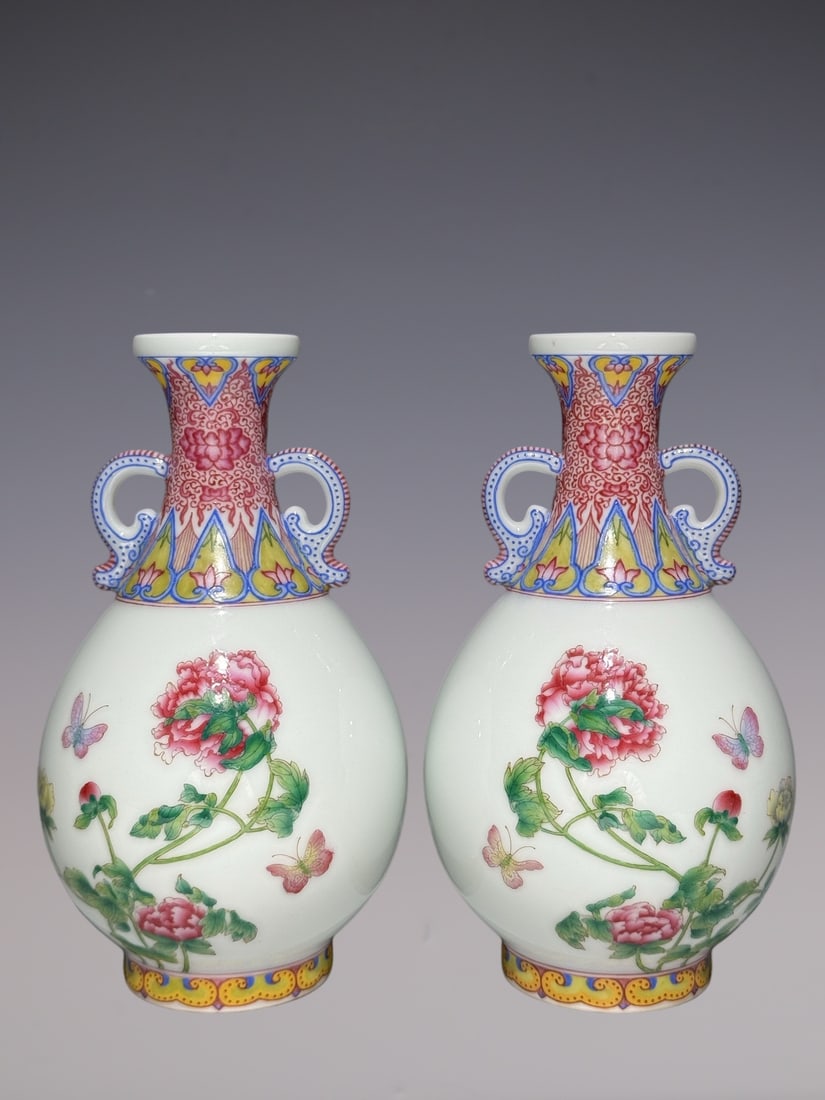 A Pair of Exquisite Enamel Flower and Butterfly Pattern Double-Ears Vases,With Poem: A Pair of Exquisite Enamel Flower and Butterfly Pattern Double-Ears Vases,With Poem,Qing Dynasty, China,Qianlong Four-character Mark,Size:6.6inx3.8in一对珐琅彩花