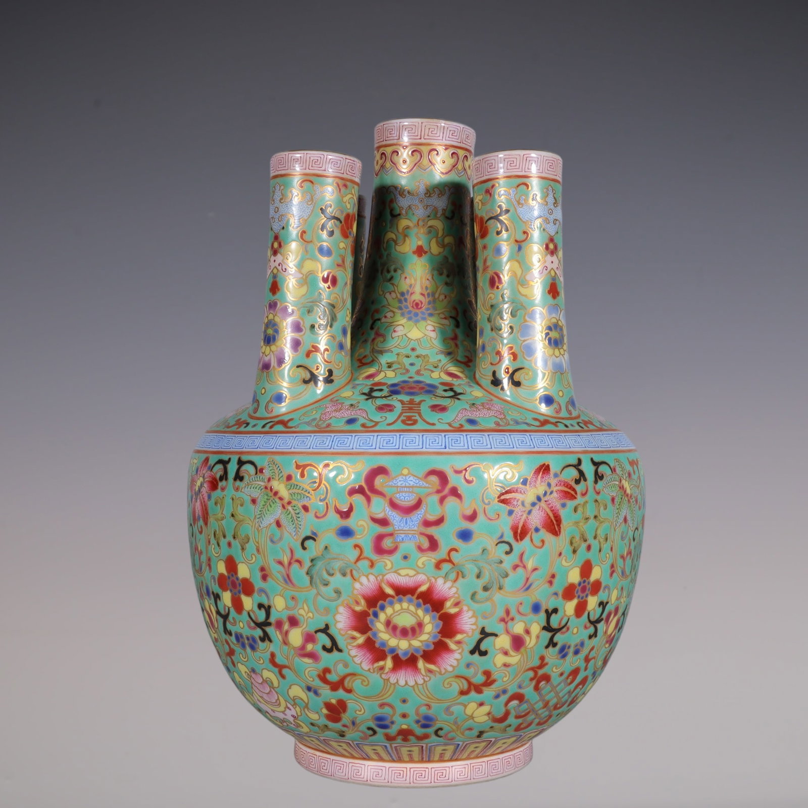 An Exquisite Enamel Turquoise Ground Painted Gold Lotus and Eight Treasures Pattern Vase: An Exquisite Enamel Turquoise Ground Painted Gold Lotus and Eight Treasures Pattern Vase,Qing Dynasty, China,Qianlong Four-character Mark,Size:10.4inx1.7inx3.9in珐琅彩松石