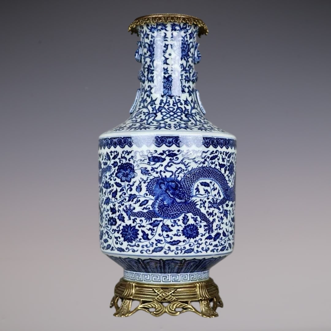 A Huge Blue and White Inlaid Bronze Lotus and Dragon Pattern Double-Ears Vase: A Huge Blue and White Inlaid Bronze Lotus and Dragon Pattern Double-Ears Vase,Qing Dynasty,China,Qianlong Six-character Mark,Size:18.5inx8.3inx7.1in青花镶铜缠枝!