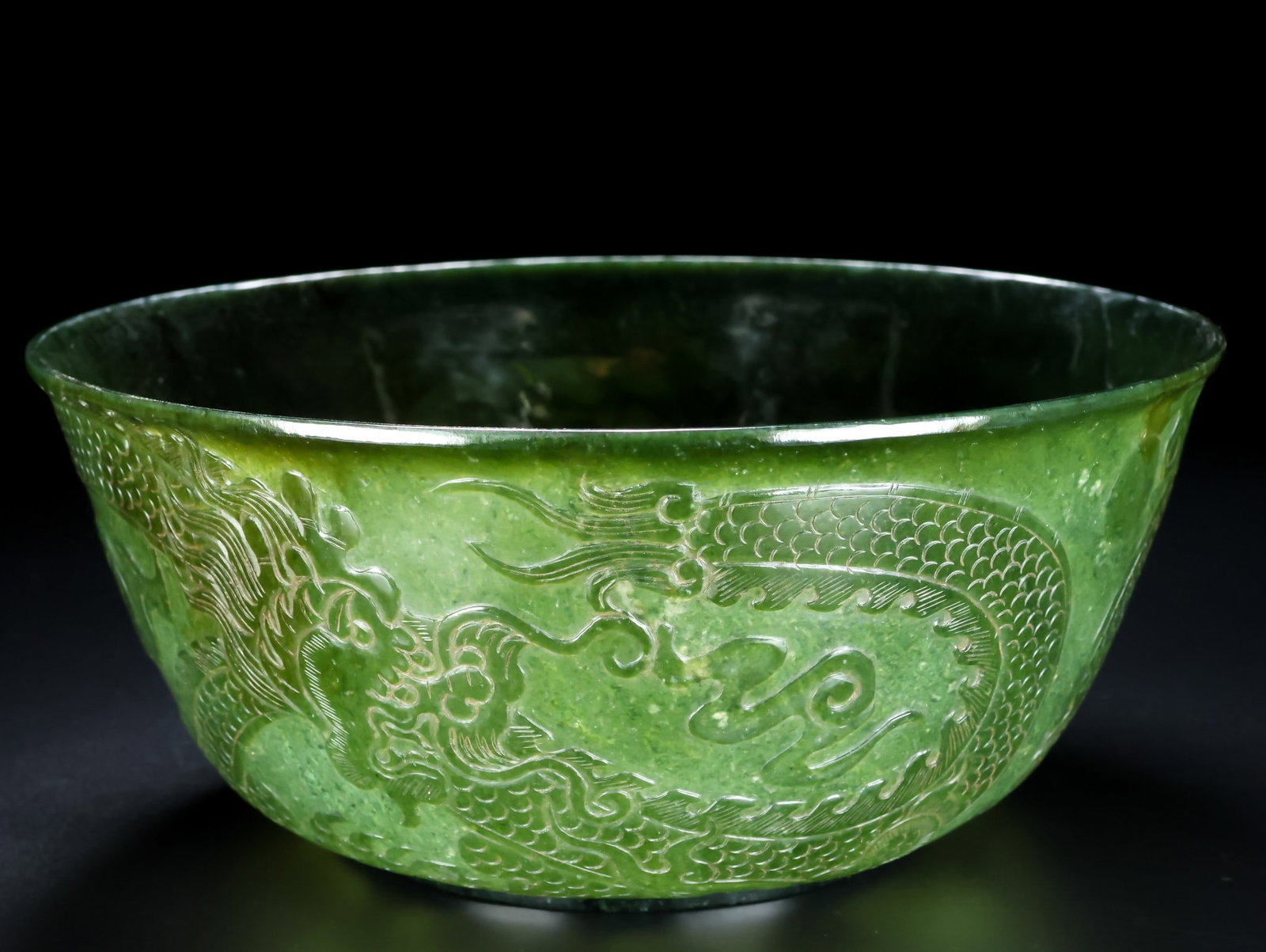 An Exquisite Jasper Auspicious Cloud and Dragon Pattern Bowl: An Exquisite Jasper Auspicious Cloud and Dragon Pattern Bowl,Qing Dynasty,China,Qianlong Four-character Mark,Size:8.7inx3.9in,Weight:450g碧玉祥云龙纹碗,ߑ