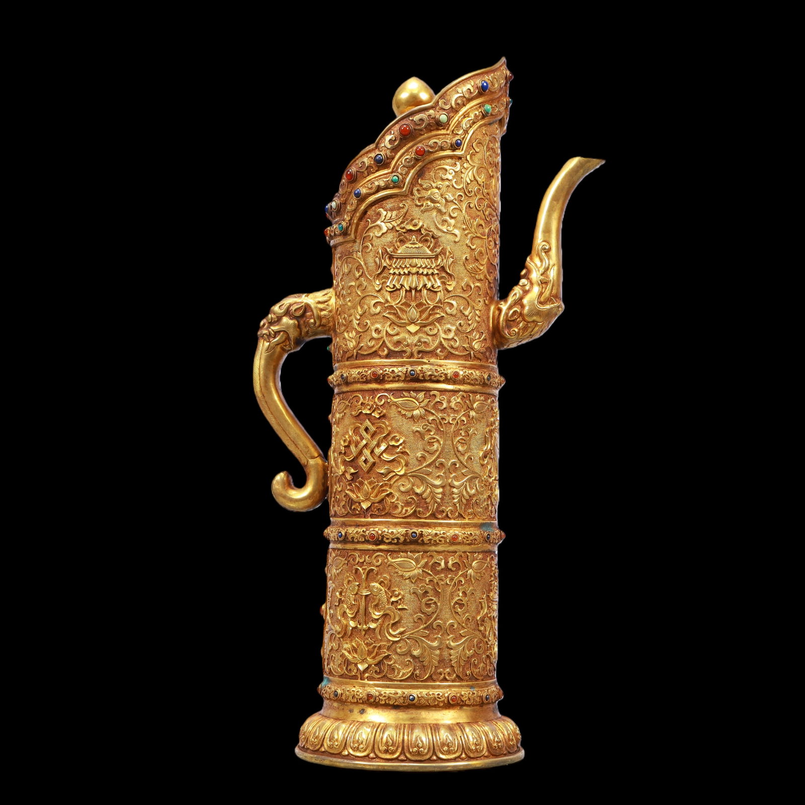 A Exquisite Gilt Bronze Inlaid Gems Lotus Pattern Ewer: A Exquisite Gilt Bronze Inlaid Gems Lotus Pattern Ewer Qing Dynasty, China Qianlong Four-character Mark Size:8.3inx5.1inx15.7in Weight:2950g铜鎏金嵌百宝缠