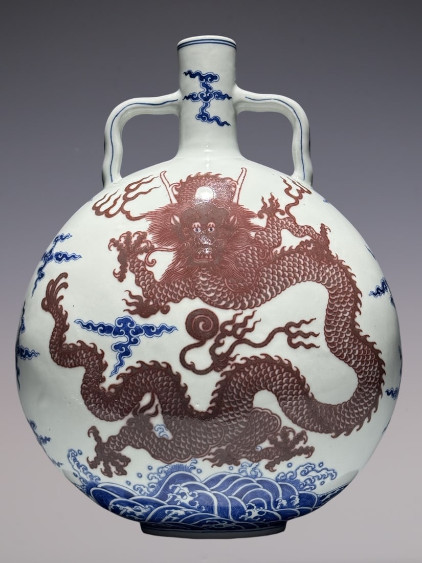 A Rare Blue and White Underglaze-Red Seawater,Auspicious Cloud and Dragon Pattern Double-Ears Vase: A Rare Blue and White Underglaze-Red Seawater,Auspicious Cloud and Dragon Pattern Double-Ears Vase,Qing Dynasty, China,Qianlong Six-character