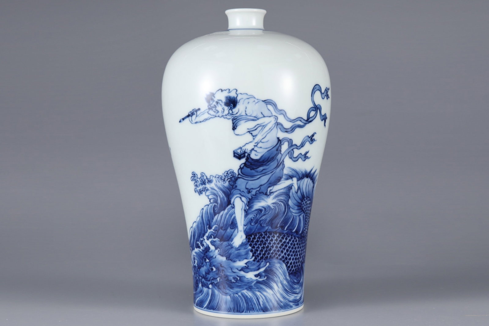 An Exquisite Blue and White Arhat and Dragon Pattern Vase: An Exquisite Blue and White Arhat and Dragon Pattern Vase,Qing Dynasty, China,Yongzheng Six-character Mark,Size:9.6inx5.5in青花罗汉像龙纹瓶,中