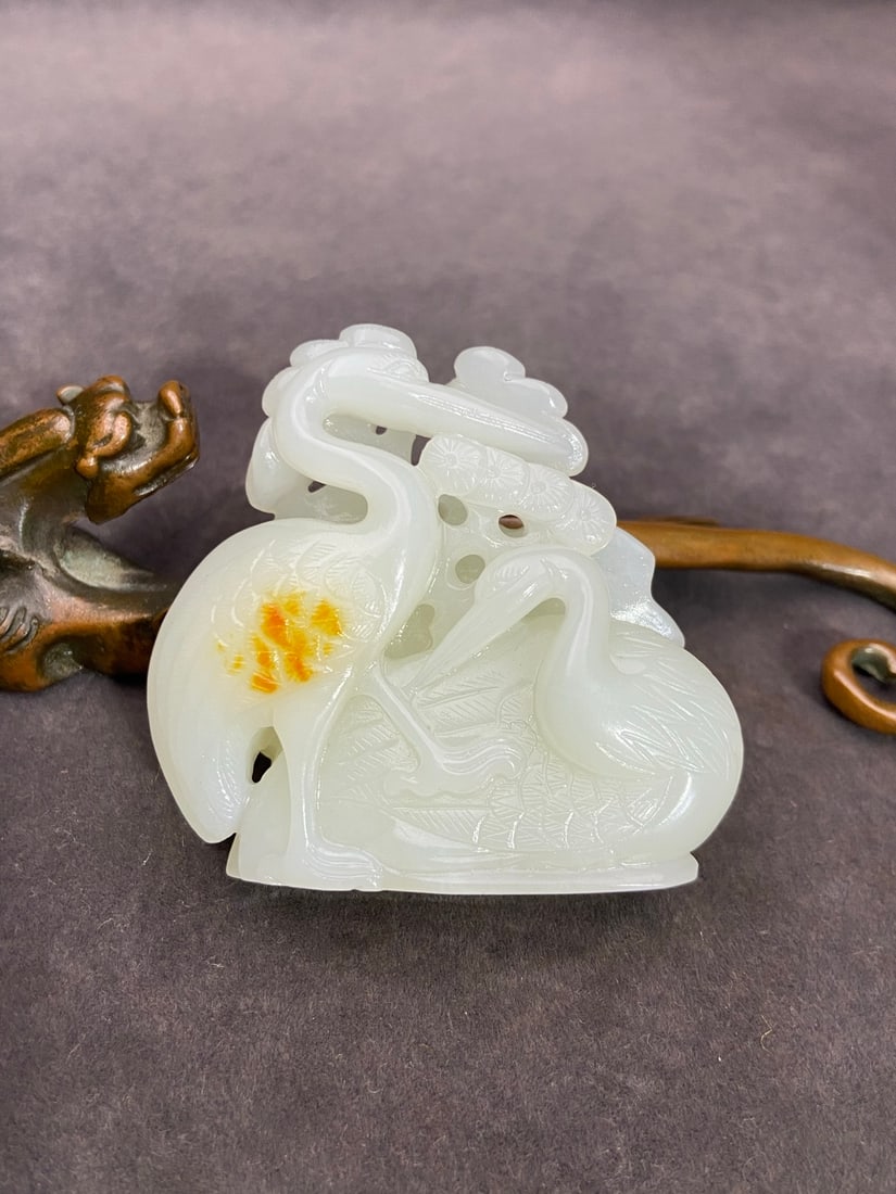 An Exquisite White Jade Pine and Crane Ornament: An Exquisite White Jade Pine and Crane Ornament,Qing Dynasty,China,Size:2.2inx2.3inx0.9in,Weight:82g白玉松鹤摆件,中国清代,Size:5.5cmx5.83cmx